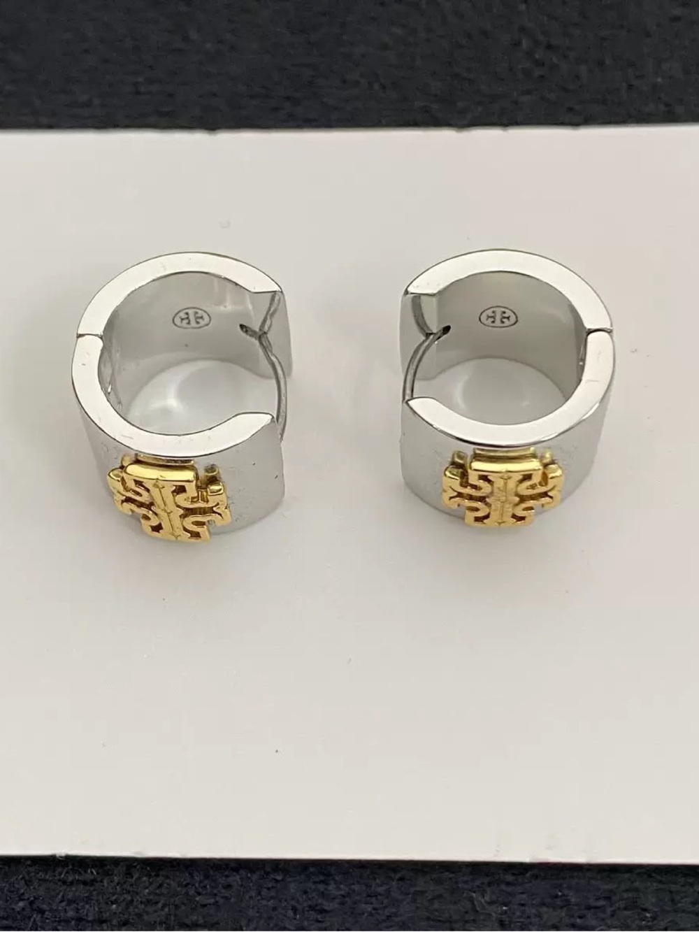 Tory Burch Two-Tone Mini Hoop Earrings in Silver with Gold Logo - Picture 2 of 3